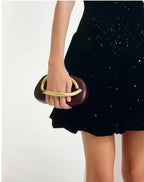 Bolsa Clutch Arewa