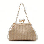 Novas bolsas de palha listradas de cor sólida populares na primavera e no verão, elegantes bolsas crossbody com corrente de pérola de nicho,