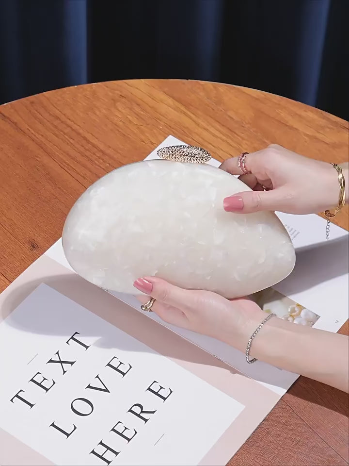 Clutch Pérola Managua